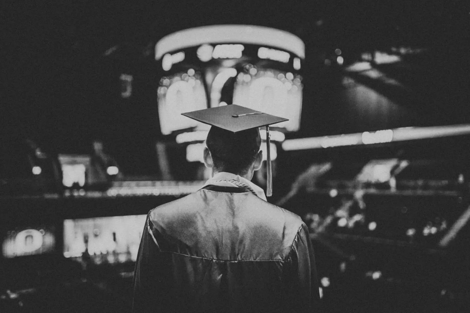College graduation scene, illustrating the education savings context behind 529 to Roth IRA rollovers
