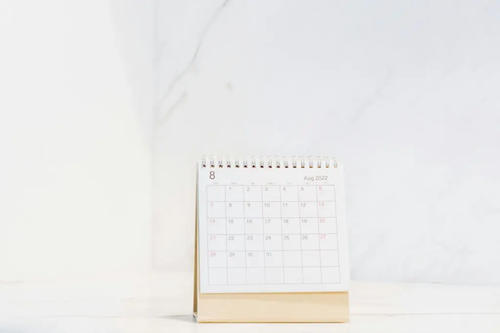 A calendar on a desk representing the annual required minimum distribution deadline
